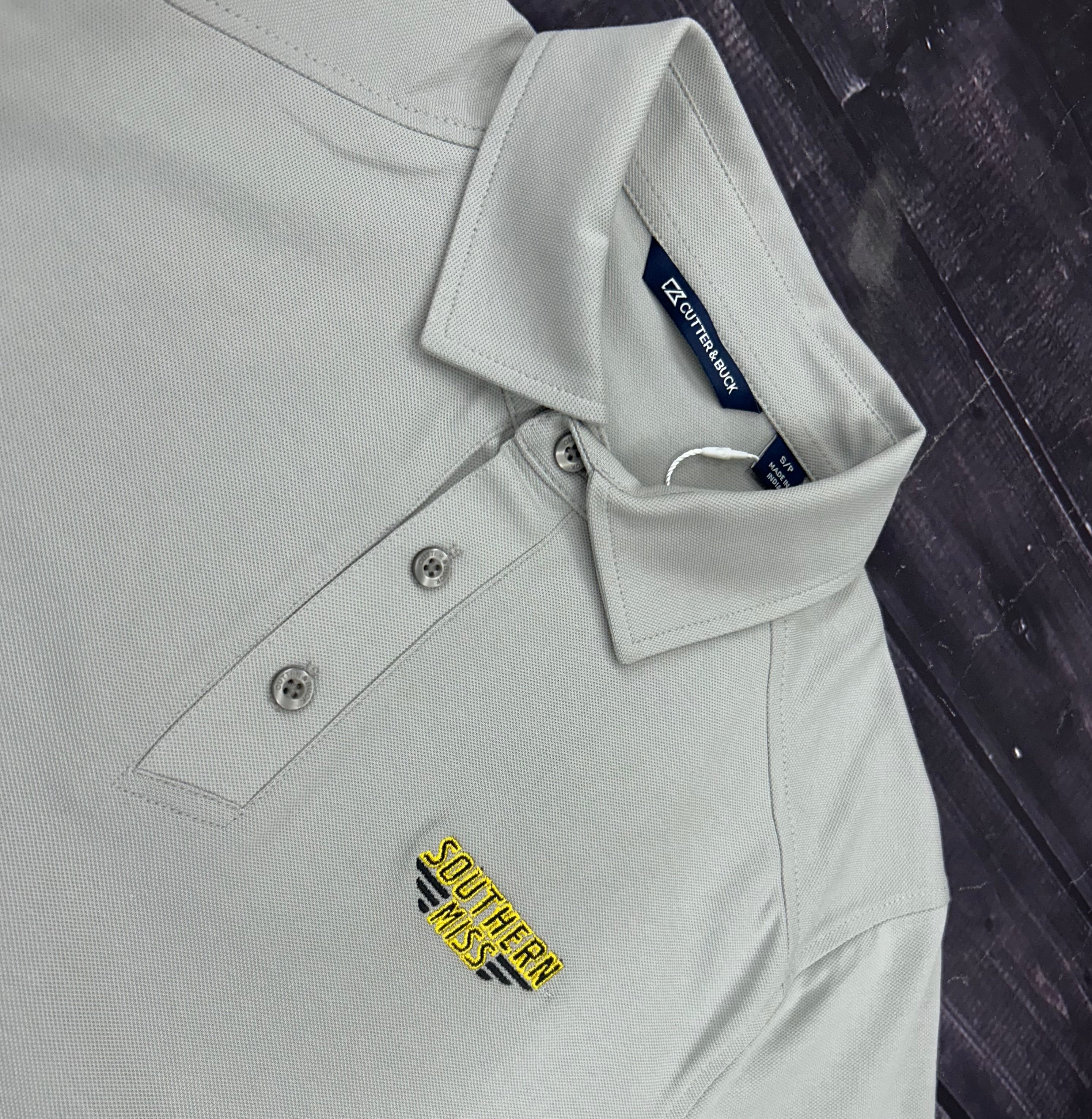 Cutter & Buck Men's Virtue Eco Pique Polo with Southern Miss Bar
