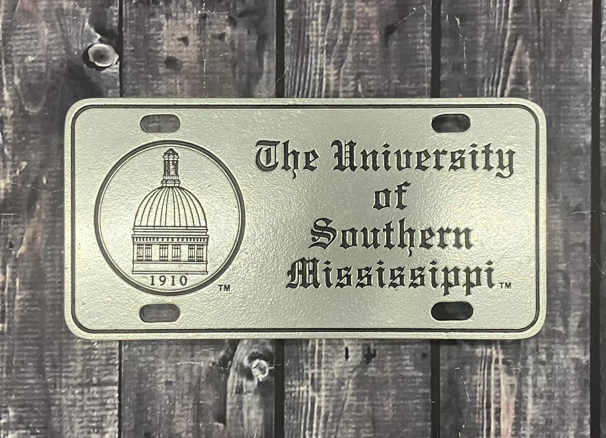 Auto License Plate Pewter with Southern Miss Seal USM in Old English Font