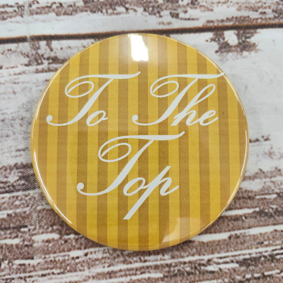 To The Top in Cursive Button
