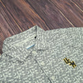 Columbia Men's Catchy Swing Short Sleeve Polo with Camo Look Print and Stacked USM